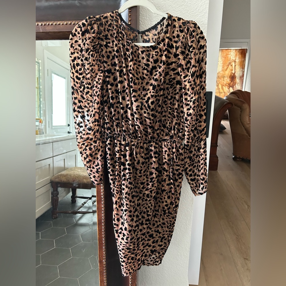 Joa knee length animal print dress with sewn in under dress. Never worn w/tags.